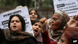 Scores of protesters have gathered near India's parliament house to protest a new law which they say is inadequate to deter all forms of sexual violence against women in New Delhi, India, February 4, 2013. 