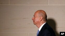 U.S. Ambassador to the European Union Gordon Sondland walks to a secure area of the Capitol to testify as part of the House impeachment inquiry into President Donald Trump, Oct. 28, 2019, in Washington. 