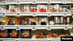 FILE - Food products are displayed at Lawson Open Innovation center during an event introducing its next-generation convenience store model in Tokyo, Japan December 4, 2017. (REUTERS/Kim Kyung-Hoon/File Photo)