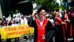 A group of lawyers dressed with judicial robes protest outside Venezuela's Supreme Court of Justice building against the absence of the rule of law in Venezuela, September 26, 2019