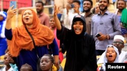 Fans react during Sudan's first women's league soccer match at the Khartoum stadium, Khartoum, Sudan, Sept. 30, 2019.