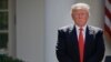 FILE - President Donald Trump stands next to the podium after speaking about the U.S. role in the Paris climate change accord in the Rose Garden of the White House in Washington, June 1, 2017. 