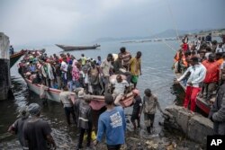 People fleeing M23 rebel advances arrive by boat in Goma, Democratic Republic of the Congo, Jan. 22, 2025.