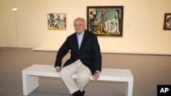FILE - Fine art dealer and billionaire David Nahmad of Lebanon poses for photographers during the opening ceremony of the exhibition "Picasso in the Nahmad Collection", Friday, July 12, 2013, in Monaco. 