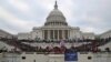 FILE - A mob of supporters of U.S. President Donald Trump storm the U.S. Capitol Building in Washington, U.S., Jan. 6, 2021. 