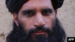 FILE - Asmatullah Shaheen Bhittani, the head of the supreme shura in the Waziristan tribal area near the Afghan border, June 2012.