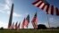 U.S. flags representing suicides of active and veteran members of the military line the National Mall, Oct. 3, 2018. The suicide rate among female veterans is lower than that of male veterans, but female veterans are almost twice as likely to kill themselves as civilian women.