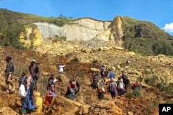 Penduduk desa Yambali di Dataran Tinggi Papua Nugini, Minggu 26 Mei 2024. (Kafuri Yaro/UNDP Papua Nugini via AP)