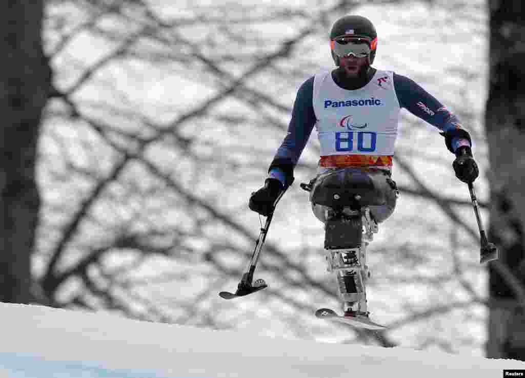 Heath Calhoun of the U.S. skis during the men&#39;s alpine skiing Super-G sitting event of the Super combined at the 2014 Sochi Paralympic Winter Games at the Rosa Khutor Alpine Center, Russia.