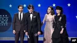 Michael Zegen, from left, Daniel Palladino, Marin Hinkle, Rachel Brosnahan, and Amy Sherman-Palladino accepts the award for best comedy series for "The Marvelous Mrs. Maisel" at the 23rd annual Critics' Choice Awards at the Barker Hangar on Thursday, Jan. 11, 2018, in Santa Monica, California.