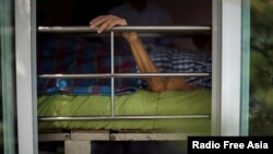 Uthai Sagulpongmalee, 70, lies in bed at Wellness Nursing Home Center in Ayutthaya, Thailand, April 9, 2016.