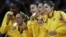 Members of the Brazil women's volleyball team show off their gold medals following a 3-1 win over the United States during the women's gold medal volleyball match at the 2012 Summer Olympics, Saturday, Aug. 11, 2012, in London. 