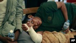 Residents who suffered burns in a fire caused when a vehicle loaded with gas exploded receive treatment at Mama Lucy Hospital in Nairobi, Kenya, on Feb. 2, 2024.