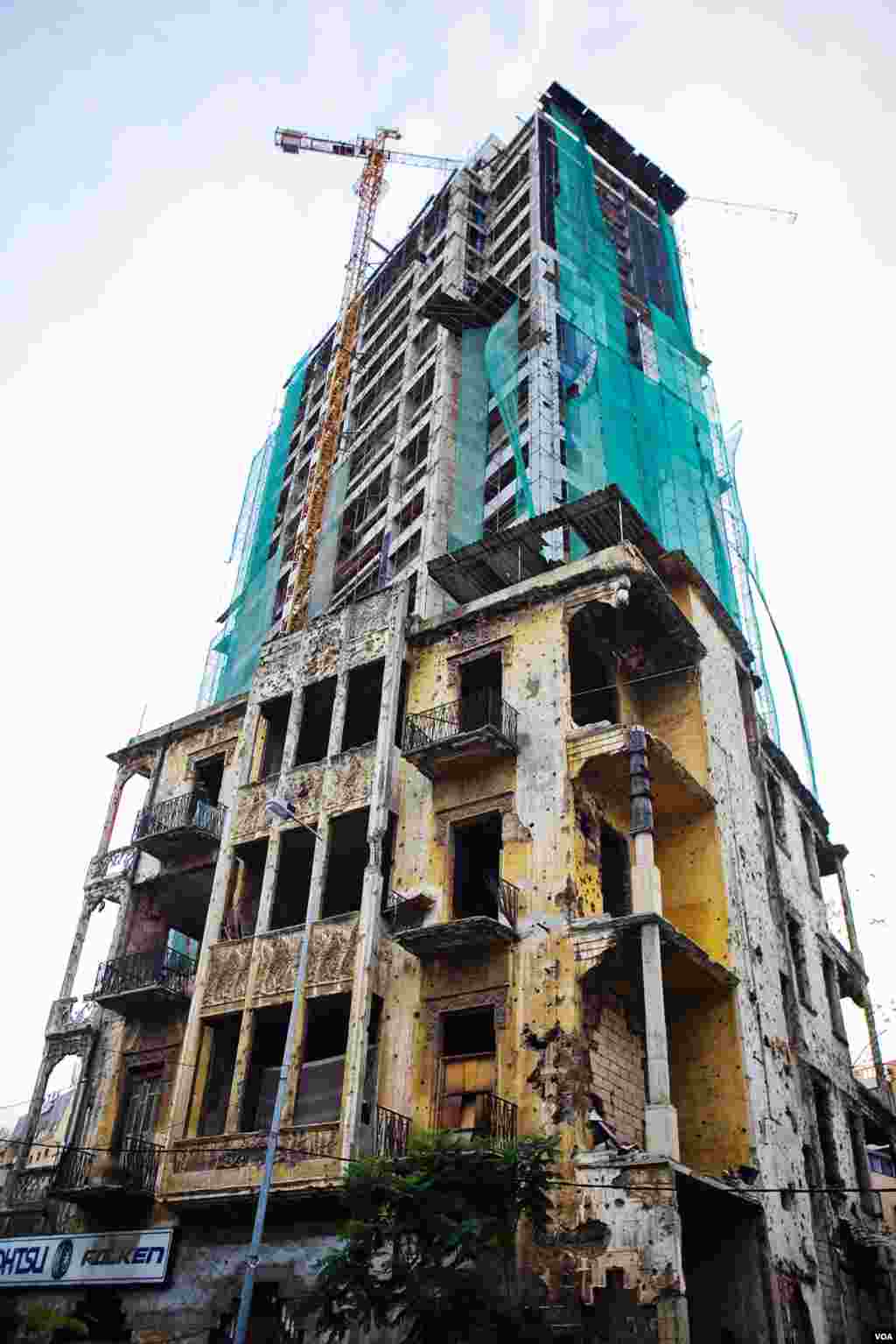 With the building frenzy reshaping Beirut, it takes a little looking to find the archaeological layer of the 1975-1990 Lebanese Civil War, only one generation ago. (VOA/V. Undritz)