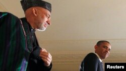 Karzay Amerika maxsus kuchlari bilan xizmat qilayotgan afg’onlarni Vardak aholisini qiynoqqa solganlikda ayblab, amerikaliklardan viloyatni bo’shatishni so’ragan.