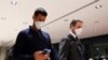 Serbian tennis player Novak Djokovic walks in Melbourne Airport before boarding a flight, after the Federal Court upheld a government decision to cancel his visa to play in the Australian Open, in Melbourne, Australia, January 16, 2022.