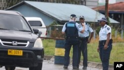 Solomon Islands police and Australian Federal Police man road blocks in Honiara, Solomon Islands, Dec. 6, 2021.