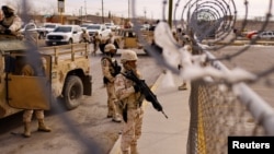 Members of the Mexican Army arrive at Cereso number 3 state prison after unknown assailants entered the prison and freed several inmates, resulting in injuries and deaths, in Ciudad Juarez, Mexico Jan. 1, 2023.
