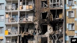 A view of the site of the damaged multi-story residential building following an alleged Ukrainian drone attack in Ramenskoye, outside Moscow, Moscow region, Russia, on Sept. 10, 2024.
