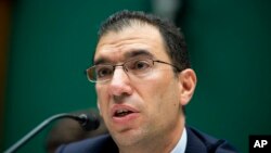 Andrew Slavitt, group executive vice president for Optum/QSSI testifies before the House Energy and Commerce Committee, Washington, Oct. 24, 2013.