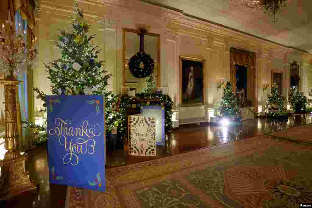 The East Room is decorated with a thank-you note theme during a press tour of White House Christmas decorations ahead of holiday receptions by U.S. President Joe Biden and first lady Jill Biden in Washington, U.S. November 29, 2021. REUTERS/Jonathan Ernst