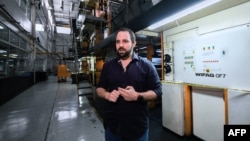 FILE - The General Manager of Venezuelan newspaper El Nacional Jorge Makriniotis speaks during an interview with the AFP, at its printing press in Caracas, June 14, 2019. 