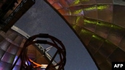 This NASA photo released March 11, 2021, shows the view from inside the dome of NASA’s Infrared Telescope Facility. The 3.2-meter telescope in Hawaii will be used to study asteroid 2001 FO32.