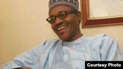 Dan takarar Shugaban Nijeriya karkashin Jam'iyyar APC Janar Muhammadu Buhari.