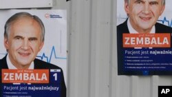 Campaign posters of Health Minister Marian Zembala of the ruling pro-business Civic Platform in Katowice, Poland, Monday, Oct. 19, 2015.