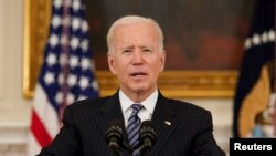 U.S. President Joe Biden delivers remarks on the state of the coronavirus disease (COVID-19) vaccinations from the State Dining Room at the White House in Washington, D.C., April 6, 2021. 
