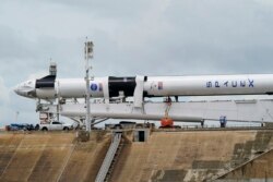 The SpaceX Falcon 9, with Dragon crew capsule, is serviced on Launch Pad 39-A, May 26, 2020, at the Kennedy Space Center in Cape Canaveral, Florida.