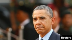 Presiden AS Barack Obama dalam upacara penyambutan di luar Gedung Parlemen di Kuala Lumpur 26 April 2014. (REUTERS/Samsul Said)