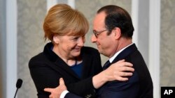 Le président français François Hollande et la chancelière allemande Angela Merkel à Minsk and février 2015 