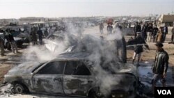 Bom bunuh diri di luar kota Karbala minggu lalu (1/20). Sebuah bom meledak di terminal bus Karbala, Senin (1/24).