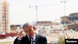 以色列总理内塔尼亚胡在犹太人定居点的一个新建筑工程前发表讲话(2015年3月16日)
