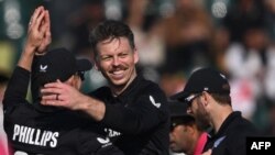 New Zealand's Michael Bracewell (C) celebrates the wicket of Bangladesh's Mushfiqur Rahim (not pictured) during the ICC Champions Trophy one-day international (ODI) cricket match between Bangladesh and New Zealand at the Rawalpindi Cricket Stadium in Rawa