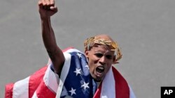 Kefleyigi posle pobede na 118. Bostonskom maratonu, 21. aprila 2014. godine