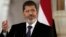 FILE - Egyptian President Mohammed Morsi speaks to reporters at the Presidential palace in Cairo, July 13, 2012.