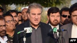 FILE - Pakistani Foreign Minister Shah Mehmood Qureshi talks with media representatives in Multan, Pakistan, Dec. 22, 2018. 