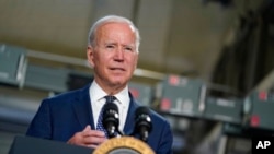 FILE - President Joe Biden speaks at Tidewater Community College, in Portsmouth, Va., May 3, 2021.
