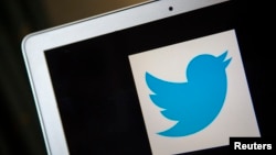 FILE - A portrait of the Twitter logo in Ventura, California.