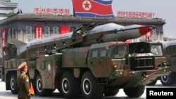 FILE - A missile is carried by a military vehicle during a parade in Pyongyang July 27, 2013.