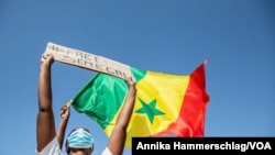 Hundreds of Senegalese women joined nationwide protests in Dakar on March 8, 2021, to express their frustrations with the government and to show support for sexual abuse victims. (Annika Hammerschlag/VOA)