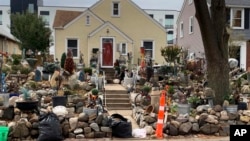 In this undated photo provided by the City of St. Paul, Minnesota, the front exterior of Iris Logan's home is pictured. (City of St. Paul, Minnesota via AP)