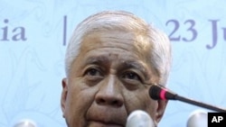 Philippine Secretary of Foreign Affairs Albert Del Rosario listens to a question during a press conference in Nusa Dua, Bali, Indonesia, July 20, 2011