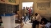 People queue to vote in Mali's presidential election in Timbuktu July 28, 2013.