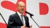 Olaf Scholz, mgombea kiti cha Ukansela kwa niaba ya chama cha tSocial Democratic (SPD), akizungumza na waandishi habari mjini Berlin, Germany, Sept. 27, 2021. 