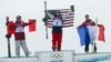 Canada's second placed Mike Riddle, first placed David Wise of the U.S. and France's third placed Kevin Rolland (L-R) celebrate on the podium after the men's freestyle skiing halfpipe finals at the 2014 Sochi Winter Olympic Games in Rosa Khutor, Russia, F