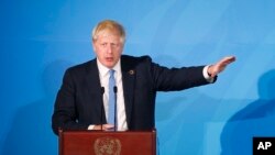 Perdana Menteri Inggris, Boris Johnson saat berpidato di hadapan peserta KTT Iklim PBB di Markas Besar PBB, New York, 23 September 2019. 