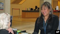 Leah Esguerra (right) is a full-time social worker assigned to work with the homeless who frequent the San Francisco Public Library.